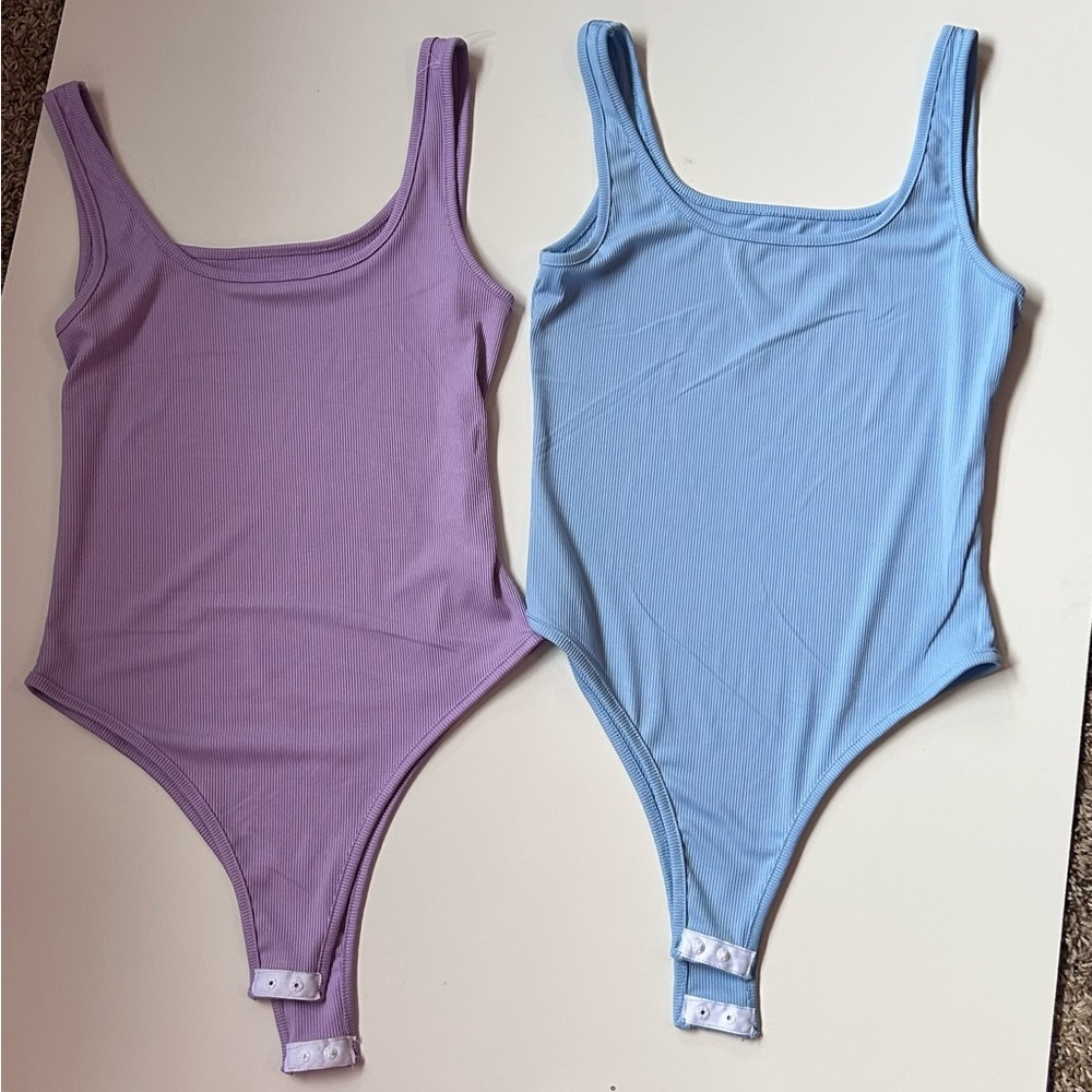 Purple and Blue Bodysuits with Scoop Neckline
Size small 2 for one (I)
